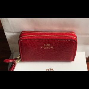 Coach double zippered card and coin wallet.